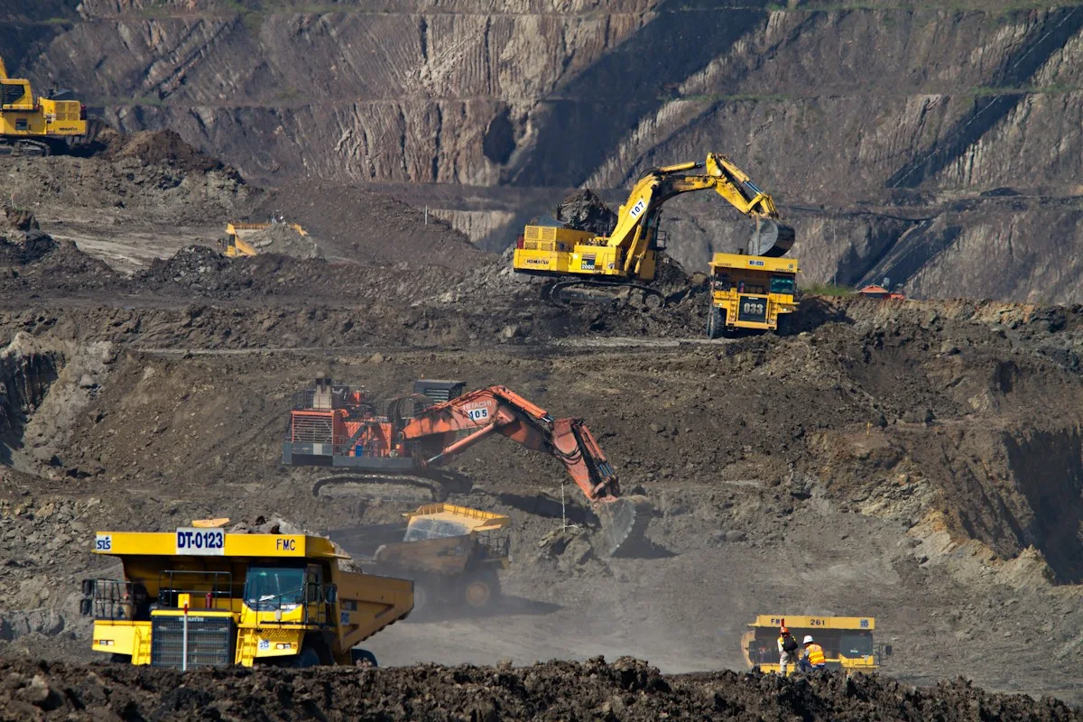 Open-pit mining site with heavy machinery